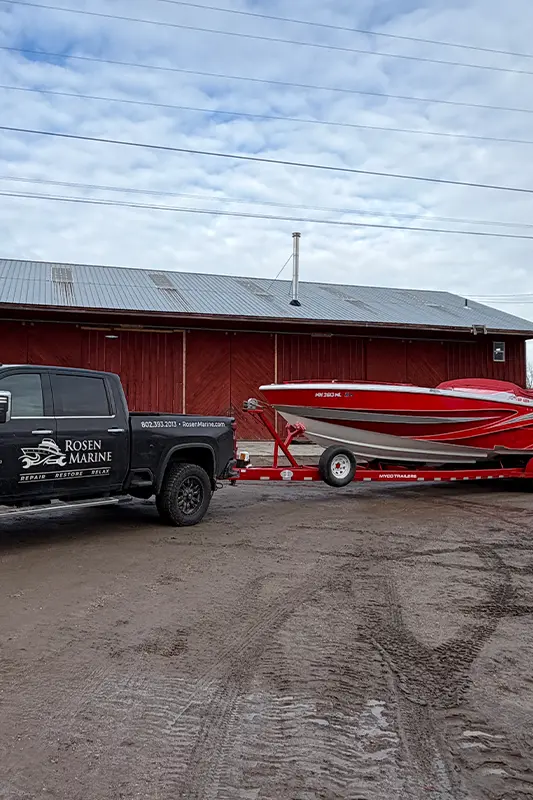 Rosen Marine boat hauling truck towing powerboat Rosen Marine truck towing a powerboat on a trailer, , used on the Florida winter boat hauling page.